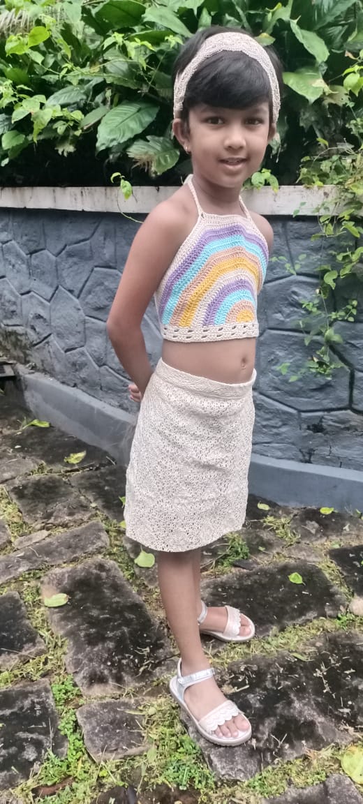 Hand crocheted rainbow top with crochet lace skirt