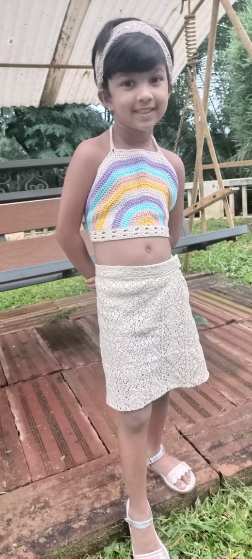 Hand crocheted rainbow top with crochet lace skirt