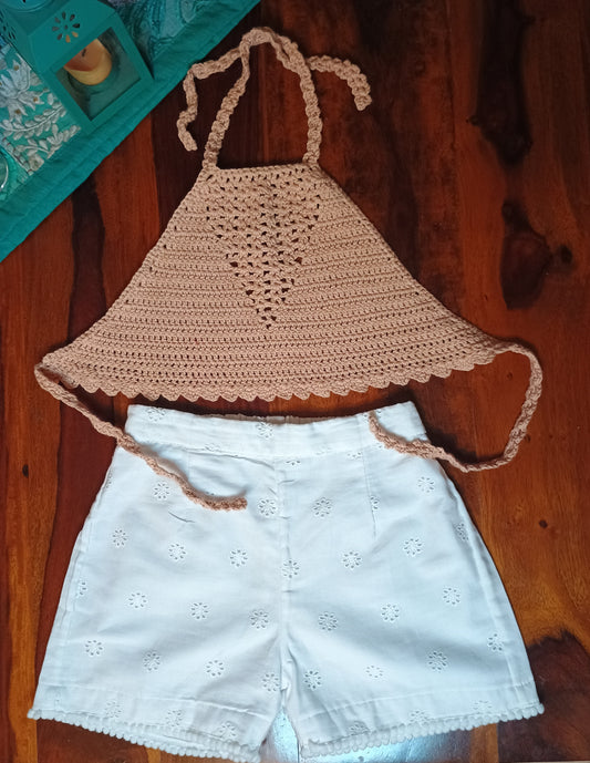 Dark beige halter neck crochet top / white hakoba shorts.